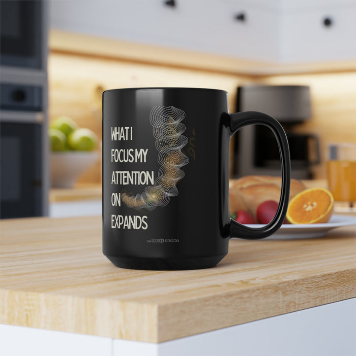 What I Focus My Attention On Expands -- Black Mug, 15oz